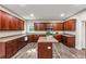 Well-equipped kitchen featuring wooden cabinets, a center island, and stainless steel appliances at 4375 Split Creek Dr, Douglasville, GA 30135