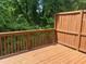 Wood deck in a peaceful, green setting, perfect for relaxation and enjoying the outdoors at 2858 Parkway Close, Lithonia, GA 30058