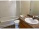 Bathroom featuring a tub/shower combo, toilet, and vanity with sink at 2858 Parkway Close, Lithonia, GA 30058