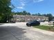 Attractive townhouse complex with well-kept grounds and convenient parking at 2858 Parkway Close, Lithonia, GA 30058
