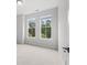 Bright bedroom with ample natural light from large windows at 240 Walker Ave, Roswell, GA 30076