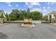 Community entrance gate with landscaping and brick accents at 240 Walker Ave, Roswell, GA 30076