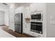 Bright kitchen with stainless steel appliances and lots of cabinet space at 240 Walker Ave, Roswell, GA 30076