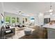 Bright living and dining area featuring an open floor plan and modern finishes, virtually staged at 240 Walker Ave, Roswell, GA 30076