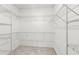 Spacious walk-in closet with wire shelving for optimal organization at 240 Walker Ave, Roswell, GA 30076