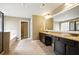 Bathroom featuring granite countertops, double vanity, tile flooring, and separate tub and shower at 3740 Lake Enclave Way, Atlanta, GA 30349