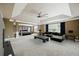 Spacious living room featuring a lounge area and canopy bed with ample natural light at 3740 Lake Enclave Way, Atlanta, GA 30349