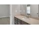 Modern bathroom vanity with sleek fixtures and ample counter space complements the neutral walls at 4204 Hardy Ave, Smyrna, GA 30082