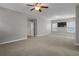 Empty bedroom showcasing spacious carpeted floors and access to an en-suite bathroom at 4204 Hardy Ave, Smyrna, GA 30082