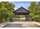 Charming covered bridge entrance within a lush, green, and welcoming community at 4204 Hardy Ave, Smyrna, GA 30082
