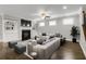 Bright living room features a fireplace with built-ins and a comfortable seating area with hardwood floors at 4204 Hardy Ave, Smyrna, GA 30082