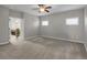 Spacious main bedroom with carpeted floors and access to an en-suite bathroom at 4204 Hardy Ave, Smyrna, GA 30082