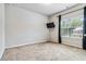 Bedroom with neutral carpet, a window, and curtains at 6094 Whitetail Deer Run, Mableton, GA 30126