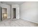 Bedroom includes neutral carpet, a closet, and easy access to the landing at 6094 Whitetail Deer Run, Mableton, GA 30126