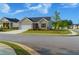 Charming single-story brick home featuring an attached two-car garage and landscaped front yard at 740 Pineberry Ct, Grayson, GA 30017