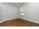 Cozy office with hardwood floors and a large window at 740 Pineberry Ct, Grayson, GA 30017