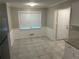 Bright eat-in kitchen features updated appliances and granite countertops at 1093 Hasty Sw Ct, Lilburn, GA 30047