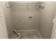 A practical laundry area is well-lit and has the relevant hookups at 1093 Hasty Sw Ct, Lilburn, GA 30047