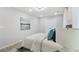 Bright bedroom with a patterned accent wall, decorative pillows, and sheer curtains for an airy feel at 1770 Atherton Dr, Decatur, GA 30035