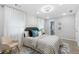 Bright bedroom with a patterned accent wall, decorative pillows, and sheer curtains for an airy feel at 1770 Atherton Dr, Decatur, GA 30035