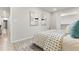 Well lit bedroom featuring stylish decor, modern artwork and wood-look flooring at 1770 Atherton Dr, Decatur, GA 30035