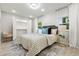 Stylish bedroom features a modern design, a large closet and wood-look flooring at 1770 Atherton Dr, Decatur, GA 30035