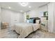 Stylish bedroom features a modern design, a large closet and wood-look flooring at 1770 Atherton Dr, Decatur, GA 30035
