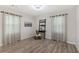 Bedroom or office space with wood-look floors and lots of natural light at 1770 Atherton Dr, Decatur, GA 30035