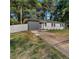 Charming single-story home with gray painted brick, complemented by a well-maintained driveway at 1770 Atherton Dr, Decatur, GA 30035