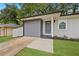 Front entrance shows the walkway to the front door and a partial view of the driveway at 1770 Atherton Dr, Decatur, GA 30035