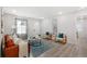 Comfortable living room with sleek hardwood floors, modern decor, and cozy seating area at 1770 Atherton Dr, Decatur, GA 30035