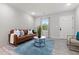 Cozy living room with modern decor, stylish furniture, and wood-look flooring at 1770 Atherton Dr, Decatur, GA 30035
