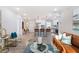 Modern living room featuring stylish decor, open layout, and seamless flow to the kitchen at 1770 Atherton Dr, Decatur, GA 30035