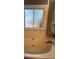 A soaking tub with a window is set in a tiled alcove at 2303 Condor Dr, Lawrenceville, GA 30044
