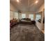 Bonus room with comfortable sofa and great natural light at 2303 Condor Dr, Lawrenceville, GA 30044