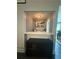 Serving counter with cabinets underneath to the side of a dining area at 2303 Condor Dr, Lawrenceville, GA 30044