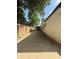 Long concrete driveway along side of house leads to detached garage at 2303 Condor Dr, Lawrenceville, GA 30044