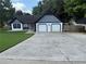 Charming single-Gathering home with a well-maintained lawn and a two-car garage at 2303 Condor Dr, Lawrenceville, GA 30044