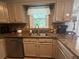 Well-equipped kitchen with stainless steel appliances and granite countertops at 2303 Condor Dr, Lawrenceville, GA 30044