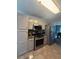 Kitchen with stainless steel appliances, granite counters and plentiful storage at 2303 Condor Dr, Lawrenceville, GA 30044