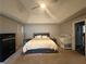 Spacious main bedroom features tray ceiling, storage bed, and room for a crib at 2303 Condor Dr, Lawrenceville, GA 30044