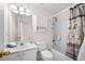 Bathroom featuring a tub-shower combination, vanity, and toilet at 3076 Harris Mill Ct, Duluth, GA 30096