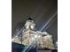 Historic clock tower with traditional architecture, illuminated at night at 3076 Harris Mill Ct, Duluth, GA 30096