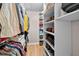 Well-organized closet with shelves and hanging space at 3076 Harris Mill Ct, Duluth, GA 30096