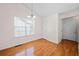 Bright dining room with hardwood floors and natural light at 3076 Harris Mill Ct, Duluth, GA 30096