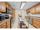 Well-equipped kitchen with stainless steel appliances and ample counter space at 3076 Harris Mill Ct, Duluth, GA 30096