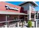 Outdoor patio seating at Dreamland BBQ with bar and dining at 3076 Harris Mill Ct, Duluth, GA 30096