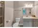 Well-lit bathroom features a glass shower, neutral walls, and modern fixtures, creating a clean, calming space at 3459 Clubland Dr, Marietta, GA 30068
