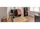 Walk-in closet has a padded ottoman, clothing racks and shelving for accessories at 3459 Clubland Dr, Marietta, GA 30068