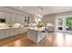 Spacious kitchen with a center island, stainless steel appliances, and light gray cabinetry at 3459 Clubland Dr, Marietta, GA 30068